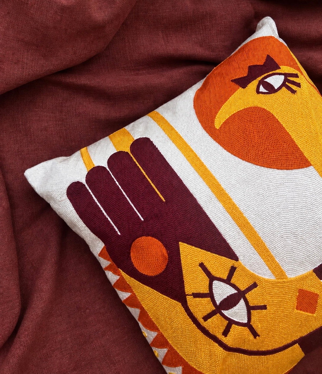 Sun bird tufted cushion