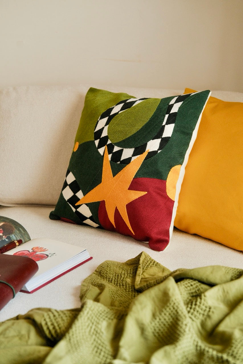 Star gaze tufted cushion