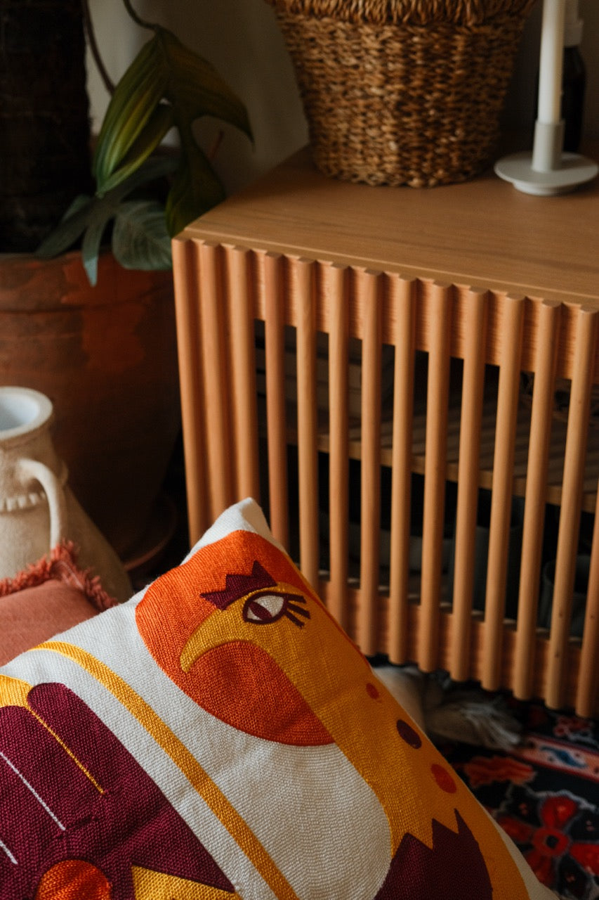 Sun bird tufted cushion