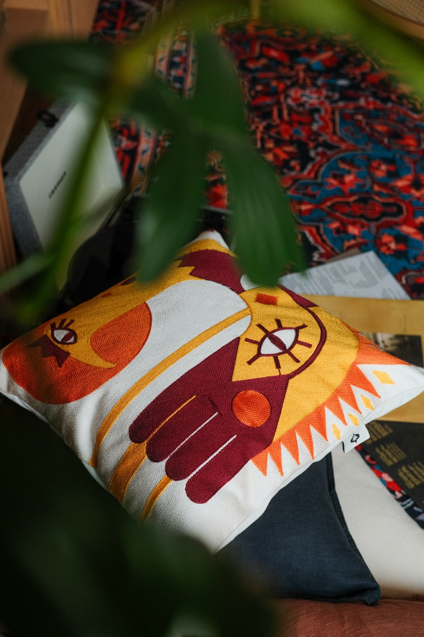 Sun bird tufted cushion
