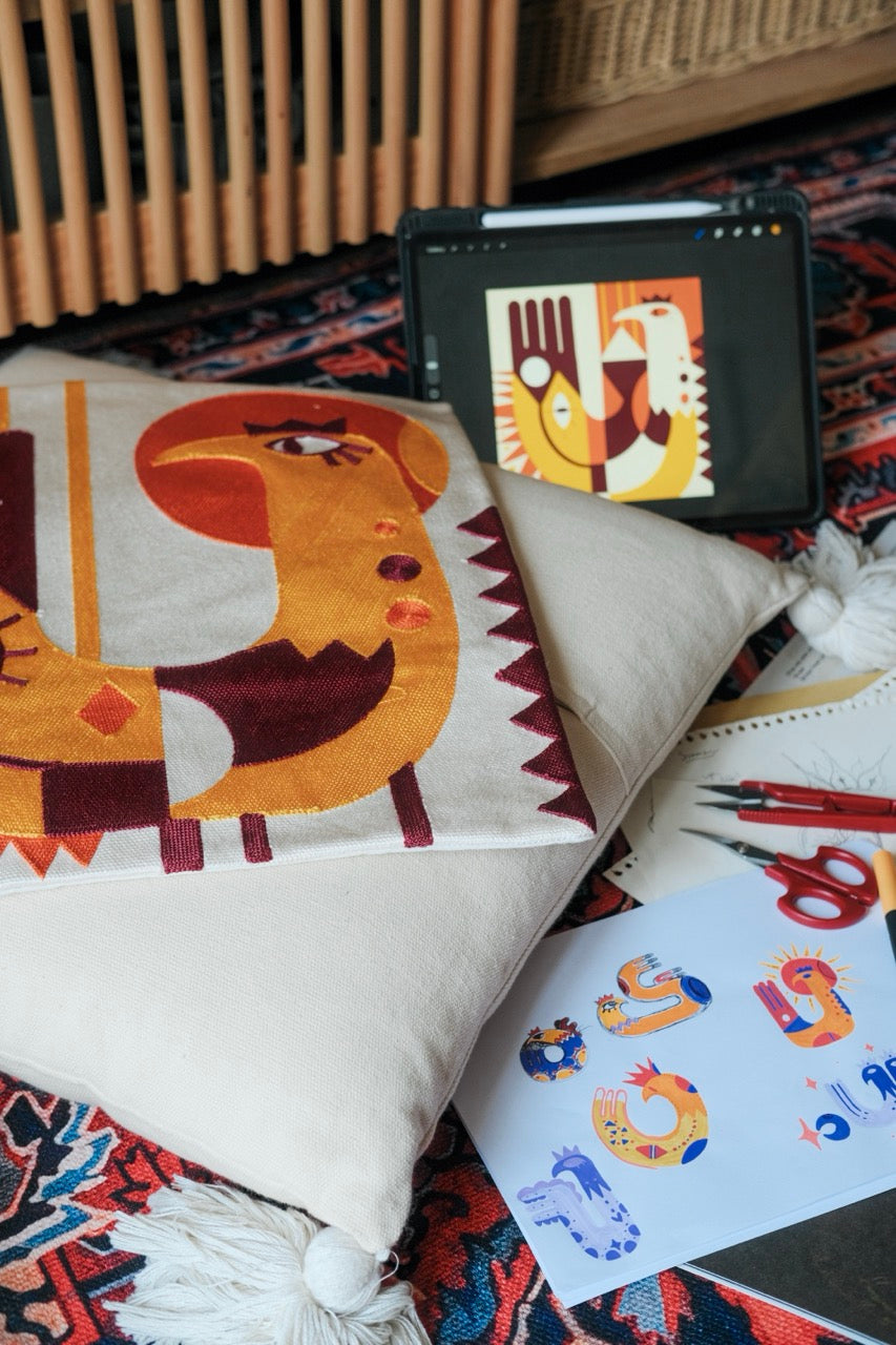 Sun bird tufted cushion