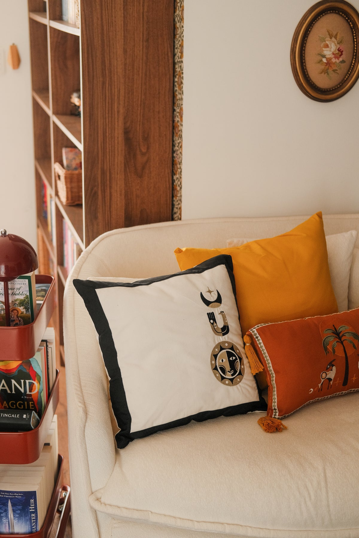 Golden trio embroidered cushion