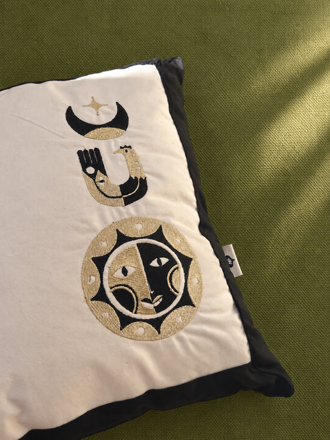 Golden trio embroidered cushion